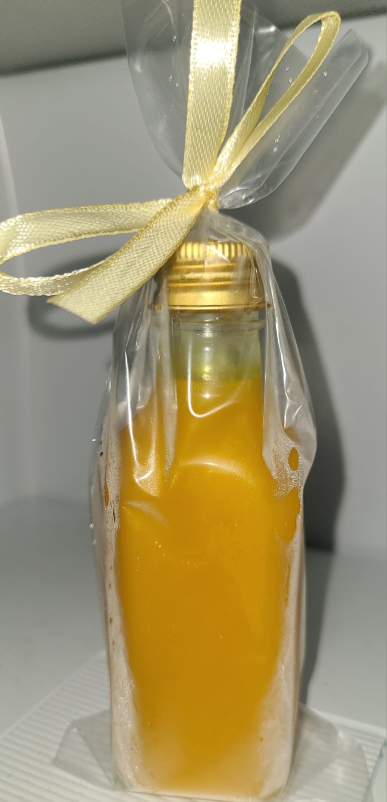 Single D-shots bottle wrapped as a gift
